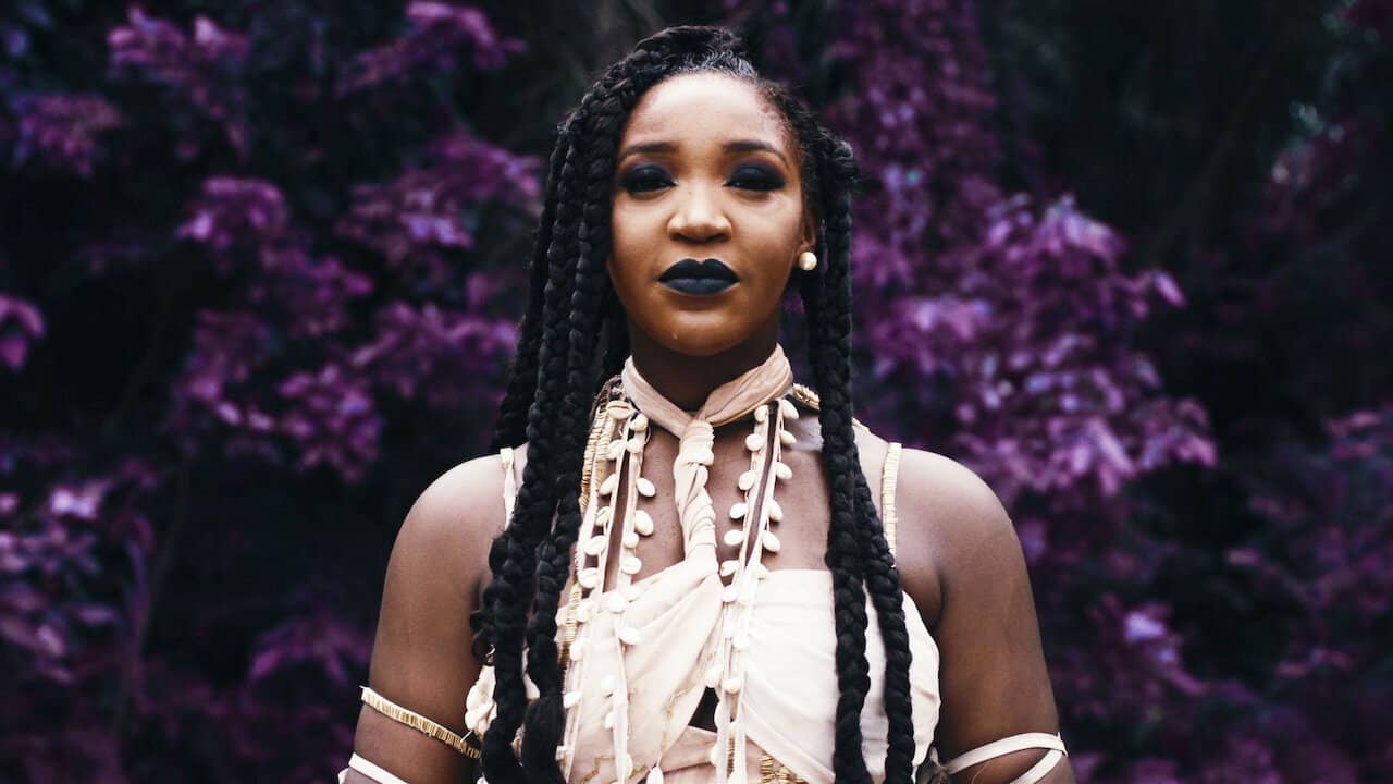 Nneka the Pretty Serpent backdrop