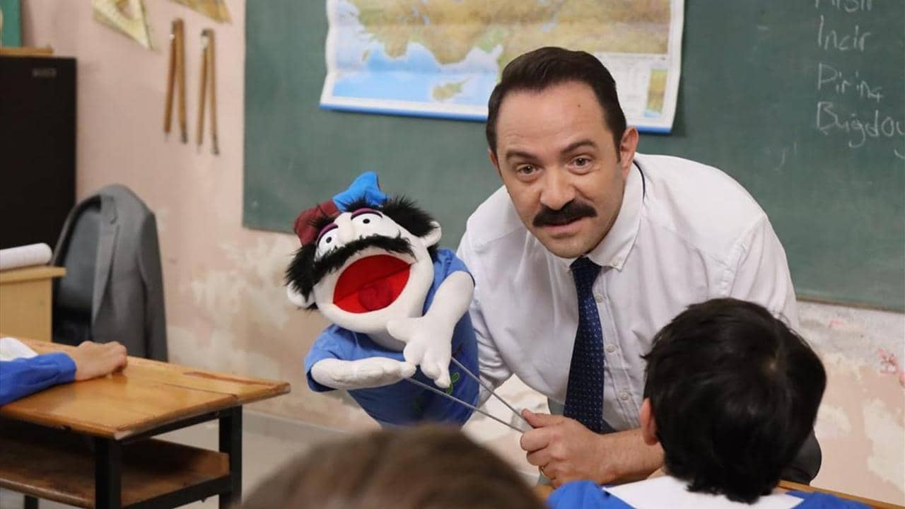 The Teacher backdrop