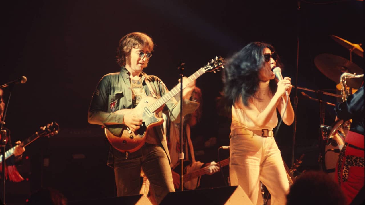 Power to the People: John & Yoko Live in NYC backdrop