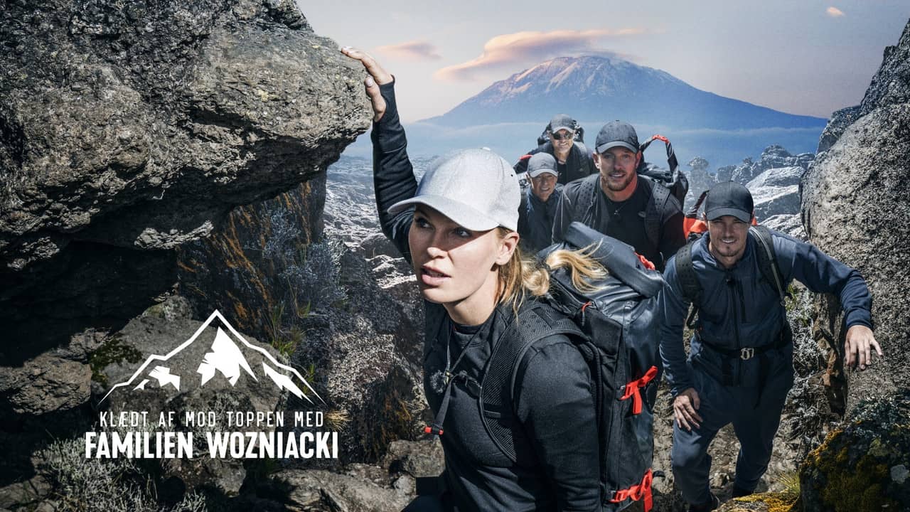 Klædt af mod toppen med familien Wozniacki backdrop