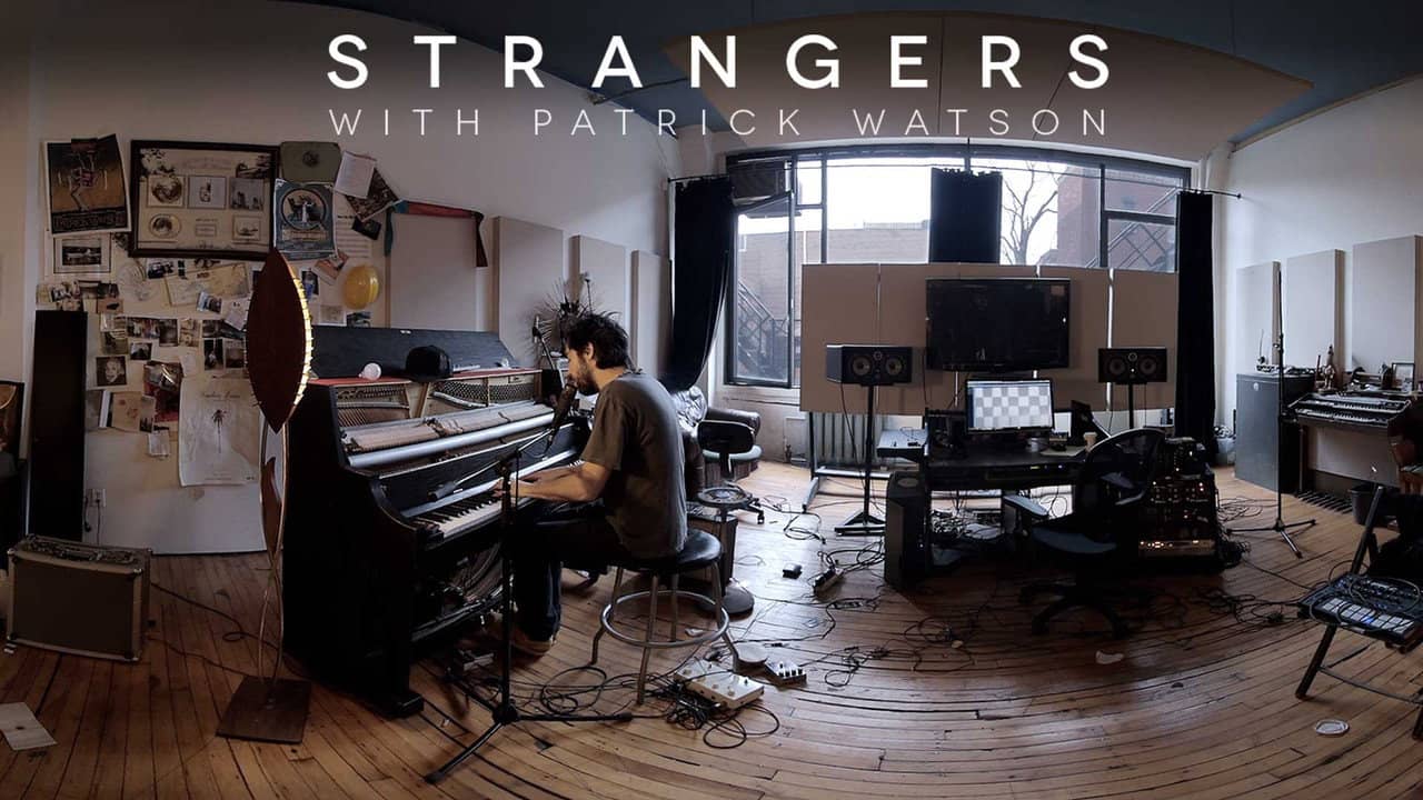 Strangers with Patrick Watson backdrop