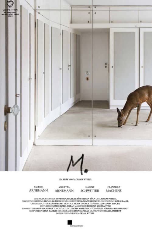 M.